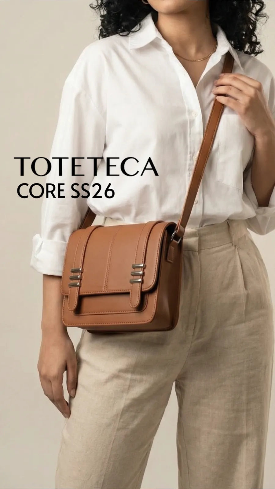 Toteteca Core SS26 - tan crossbody satchel worn with a white shirt