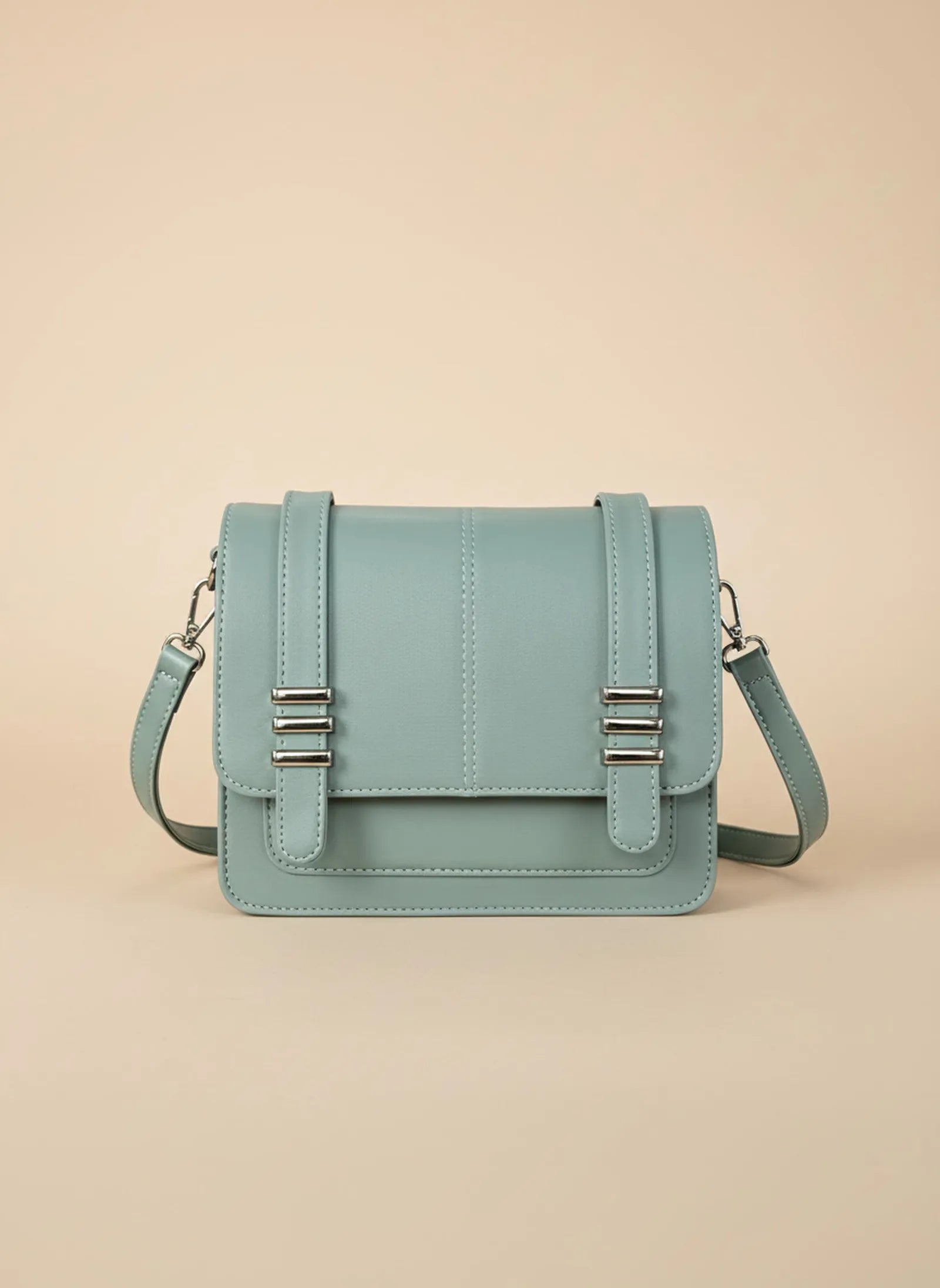 Mint green Toteteca satchel with silver hardware and crossbody strap