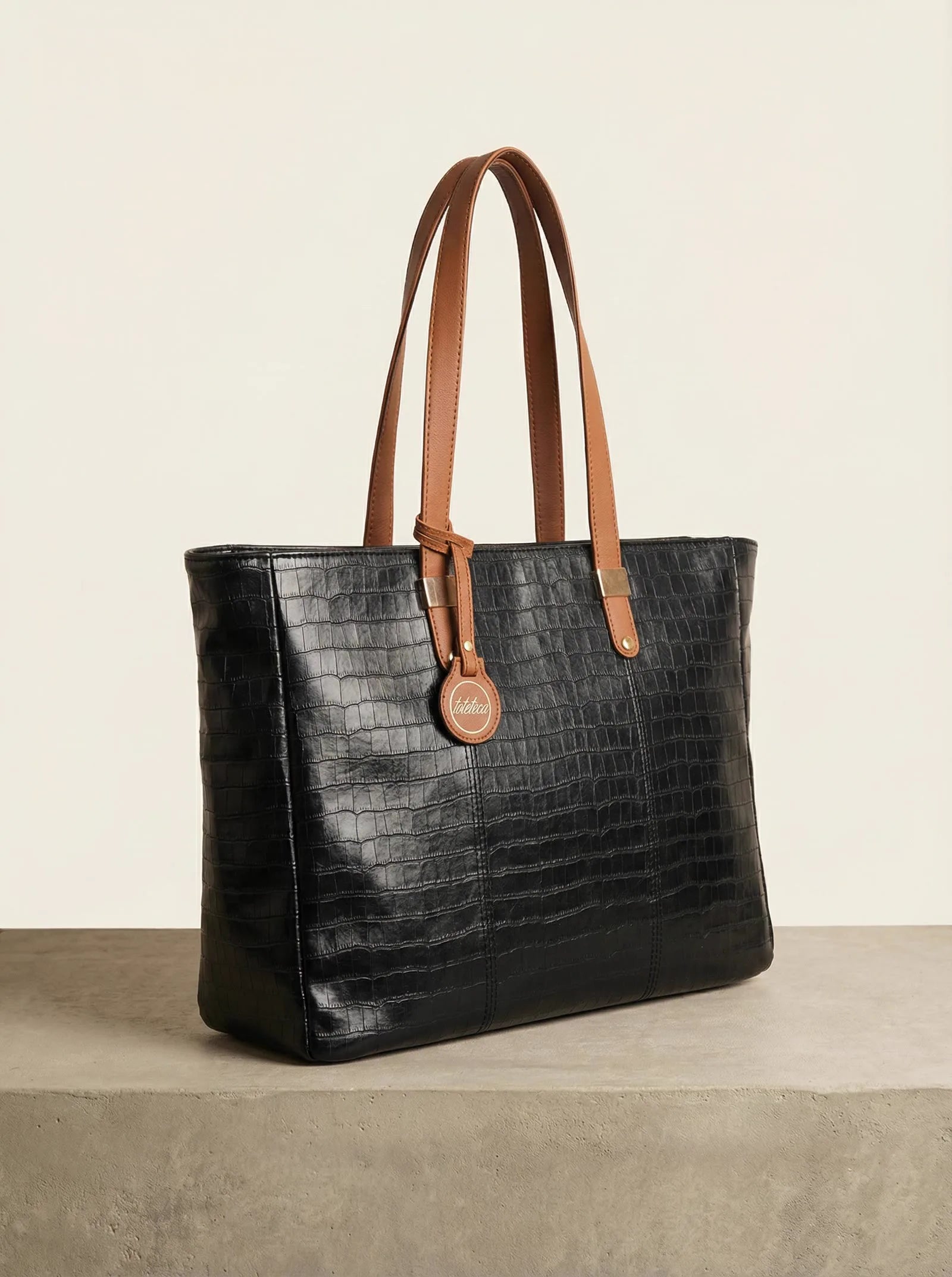 Black croc-texture Toteteca tote with tan handles