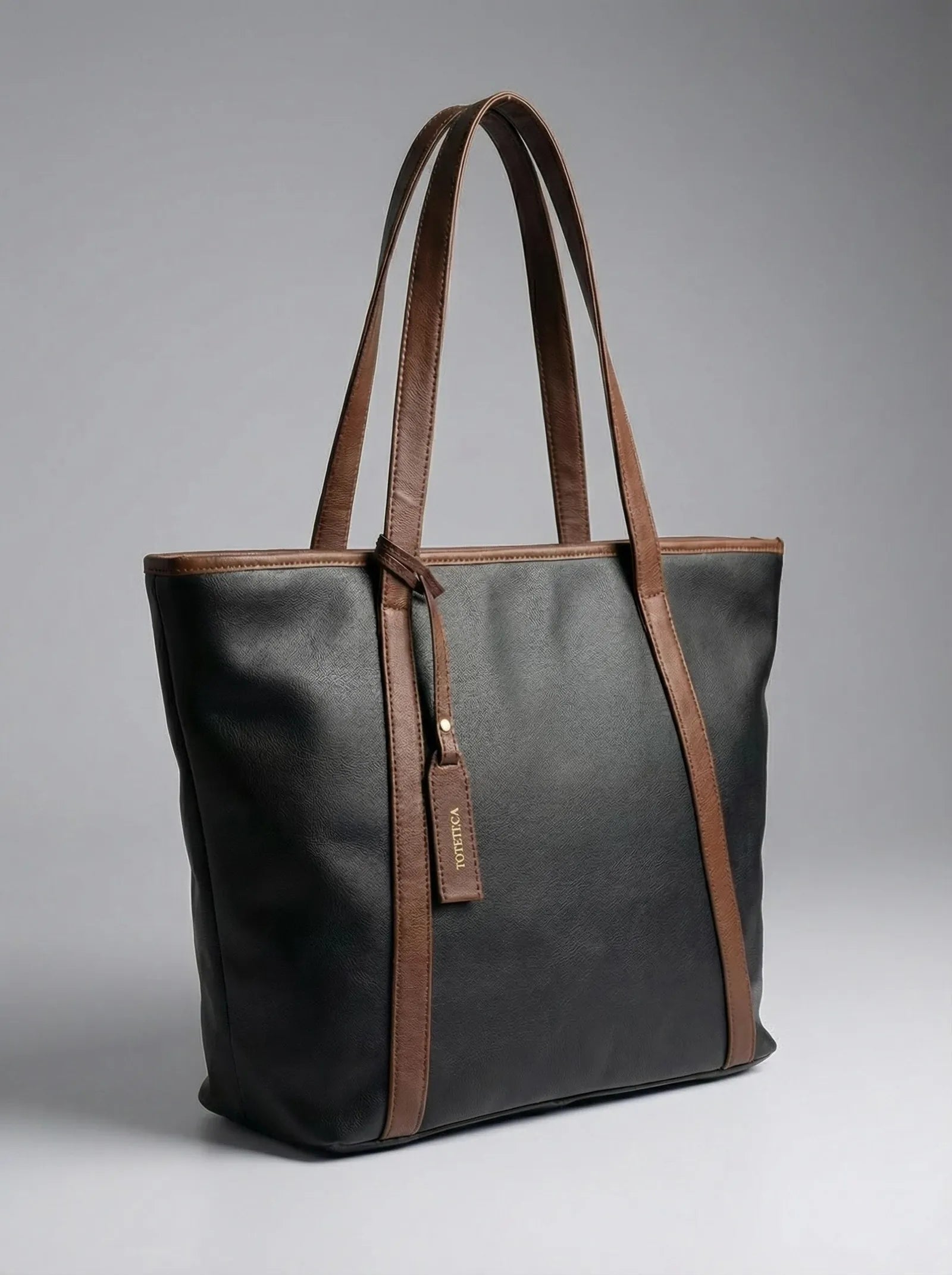Black Toteteca city tote with contrast tan straps