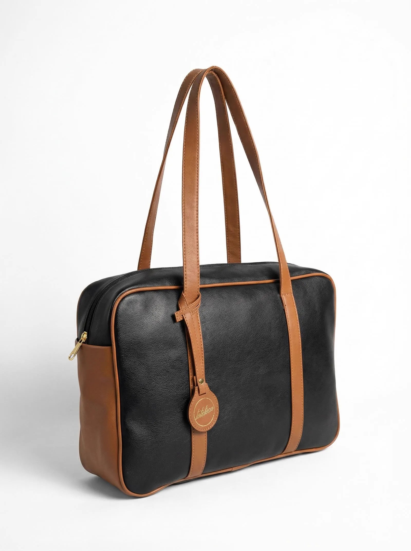 Black Toteteca office bag with tan straps and piping